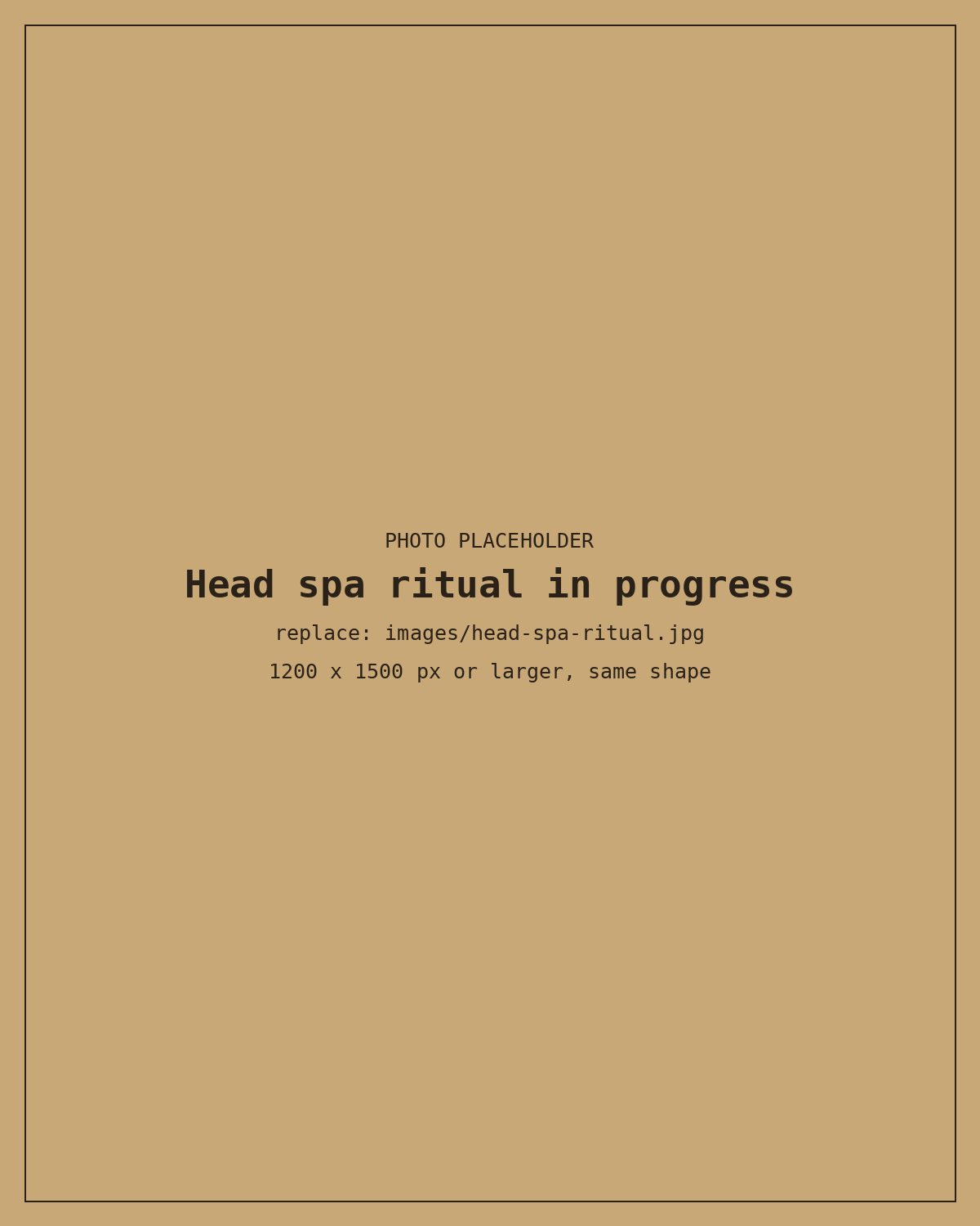 A client relaxing during a head spa treatment